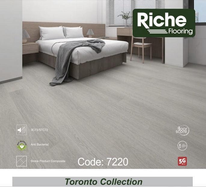 A modern bedroom which displays the beautiful look of Riche vinyl flooring.