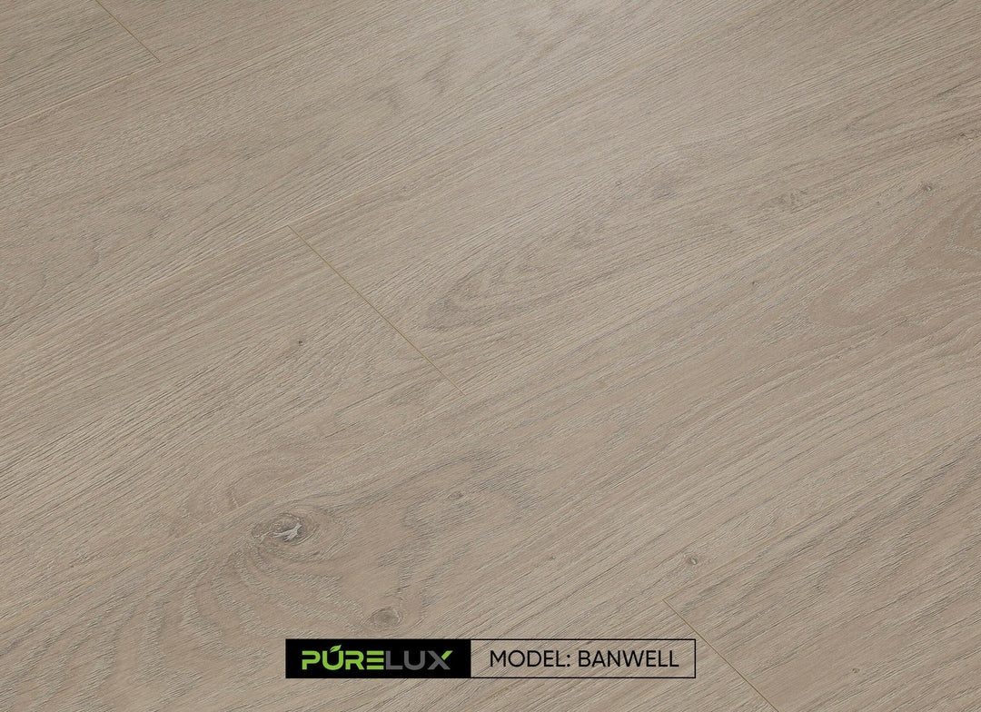 A bright and inviting room showcasing the rich, light brown tones of Purelux laminate flooring.