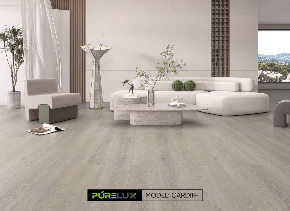 A bright and inviting room showcasing the rich, grey tones of Purelux vinyl plank flooring.