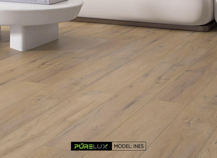 A bright and inviting room showcasing the rich, brown gray tones of Purelux vinyl plank flooring.