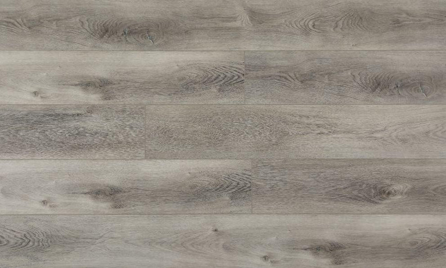 Close-up showing the texture and color of Bridge Purelux vinyl plank flooring.