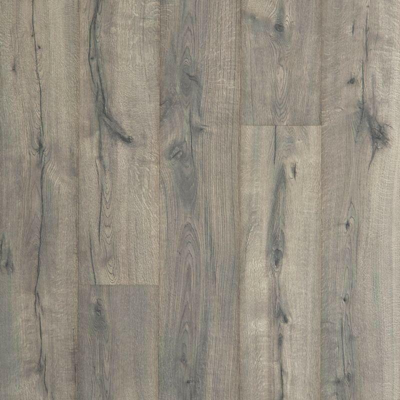 close up of Lunar Oak Mohawk RevWood Plus Castlebriar waterproof laminate sold by Advanced Flooring