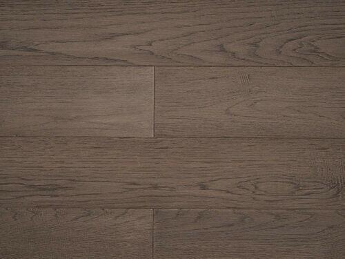 Close-up showing the texture and color of Quarry Grey NAF hickory engineered hardwood flooring.