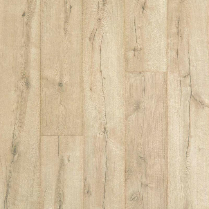 close up of Sand Pearl Oak Mohawk RevWood Plus Castlebriar waterproof laminate sold by Advanced Flooring