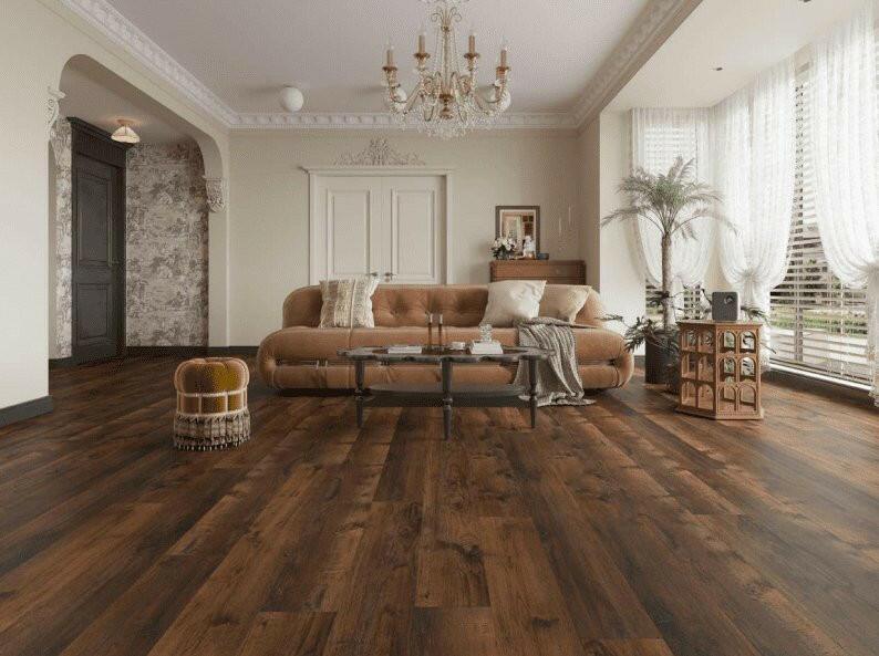 A bright and inviting living room showcasing the rich, brown tones of Purelux vinyl plank flooring.