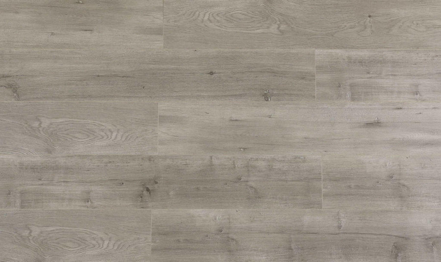 Close-up showing the texture and color of Woodlawn Purelux laminate flooring.